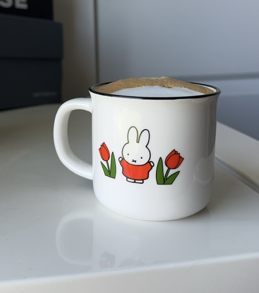 an espresso mug with a bunny on it